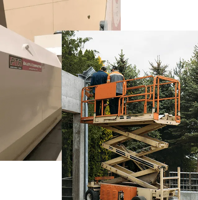 The image shows a baler machine on the left side and two workers on a scissor lift, inspecting a structure surrounded by trees on the right side.